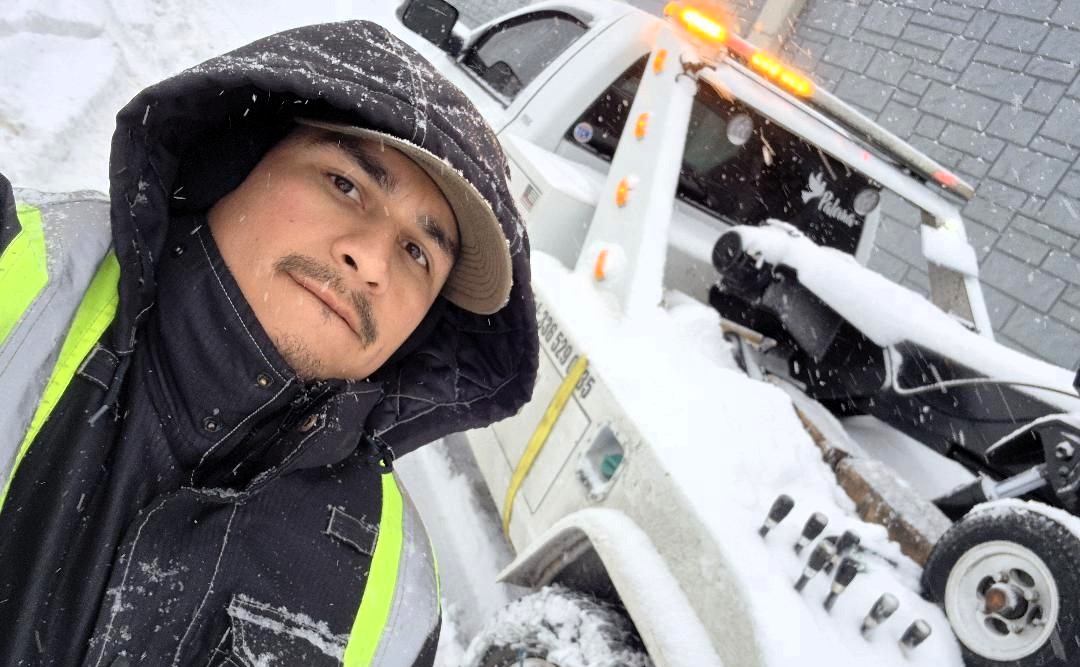 Tow truck driver plunges 10 feet down drain hidden by snow during call-out in North Carolina. Diego Burgos' bodycam captures shocking fall that left him dizzy.