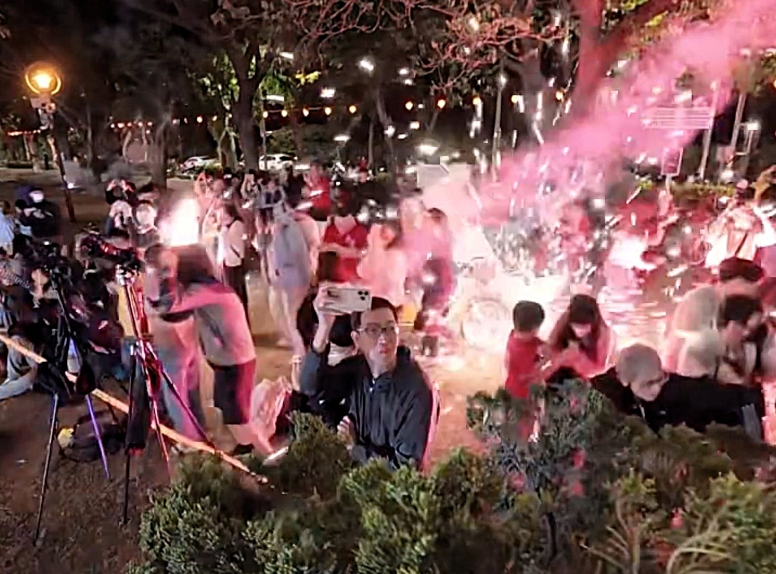 Fireworks hurtle into terrified crowd at Taiwan temple procession showering sparks. Families scramble in panic as explosions felt like air raid. Probe launched.