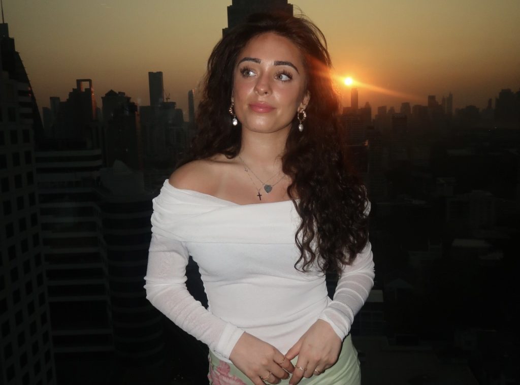 Woman's breasts grow back 6 weeks after reduction surgery in Perth. Hally Galletta getting second operation in 8 months. Surgeon took 200g from each breast.