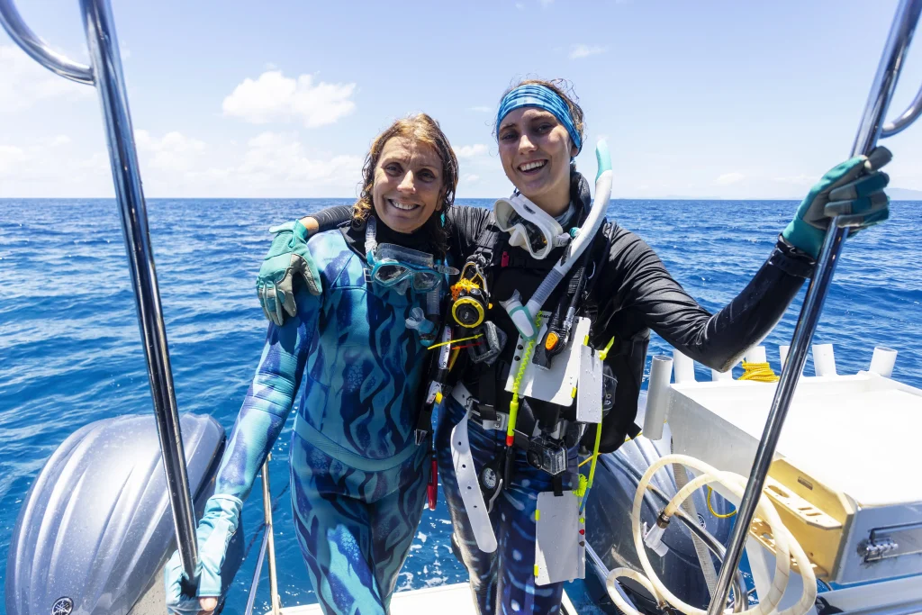World's largest coral reef colony discovered on the Great Barrier Reef by mother-daughter diving duo - stretching the length of a football field, it dwarfs all previous records.