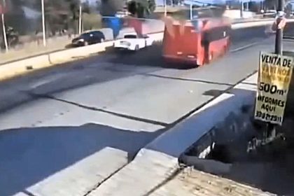 Heroic bus driver rams cartel pick-up truck to protect passengers during armed attack in Mexico - dramatic dashcam footage captures the heart-stopping moment he fights back.