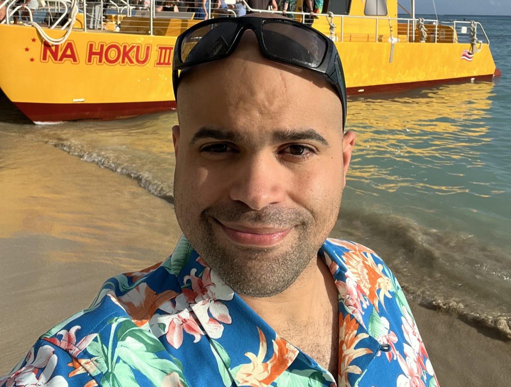 A nursing student trapped in a car fire suffered burns to half his body and endured 50 surgeries - now he helps other burn survivors find housing and hope.