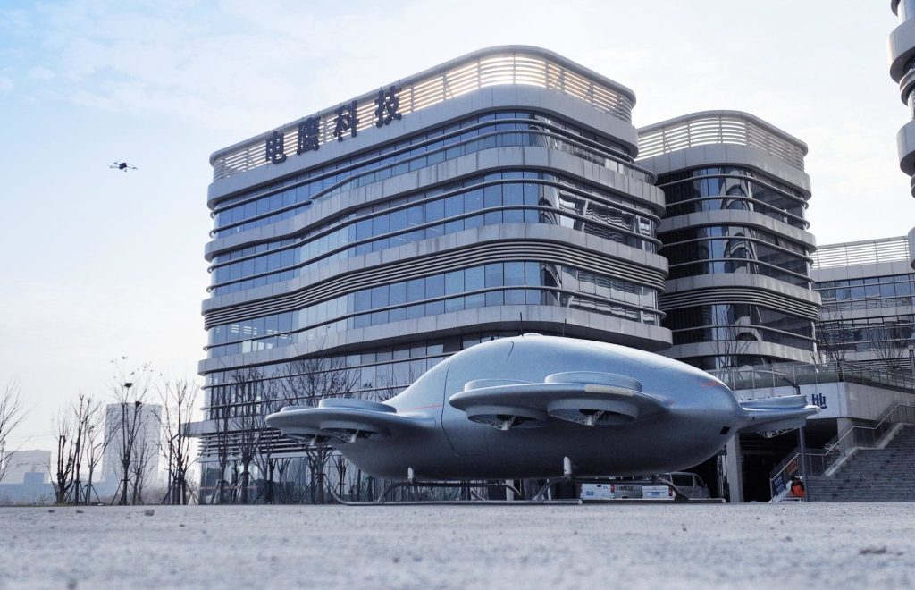 Chinese boffins develop a real-life flying saucer aircar that carries four people with no visible wings or rotors - passenger flights planned for 2027 at under £220k a pop.