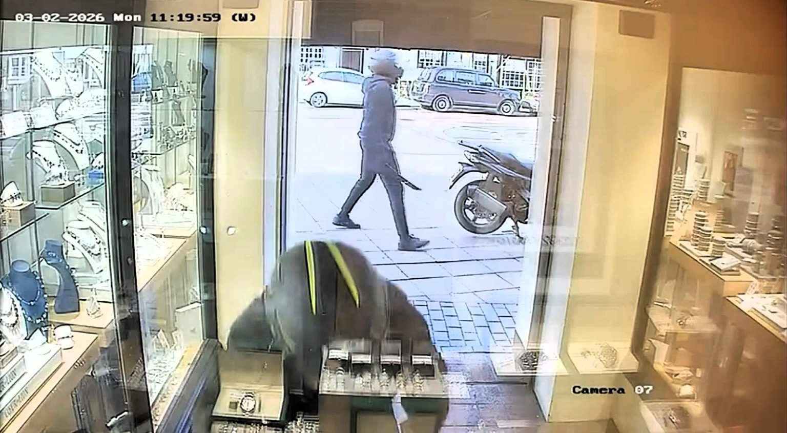 Chainsaw-wielding thugs in helmets storm town centre jewellers in brazen daylight raid caught on camera - before speeding off on a motorbike through back roads in Hertfordshire.