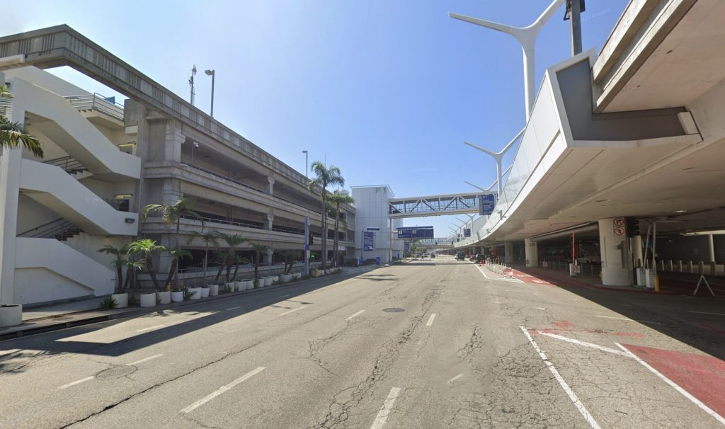 Shocking video shows airport worker throwing guitars on the floor while unloading luggage at LAX - racking up 2m views as viewers call for the baggage handler to be fired.