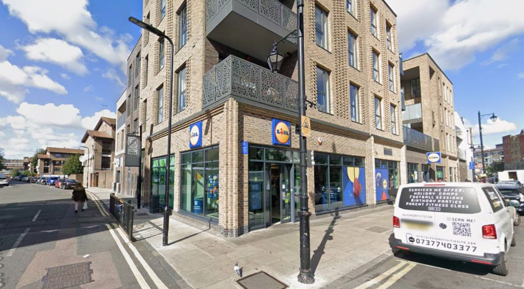 Determined Lidl worker chases down and wrestles suspected shoplifter on a London street to retrieve stolen bags - footage of the tug-of-war in Hoxton racks up thousands of views.