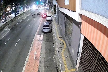 A driver had a lucky escape when a pothole exploded just inches from their car on a main road in Sao Paulo - sending debris flying in a scene resembling a volcanic eruption.