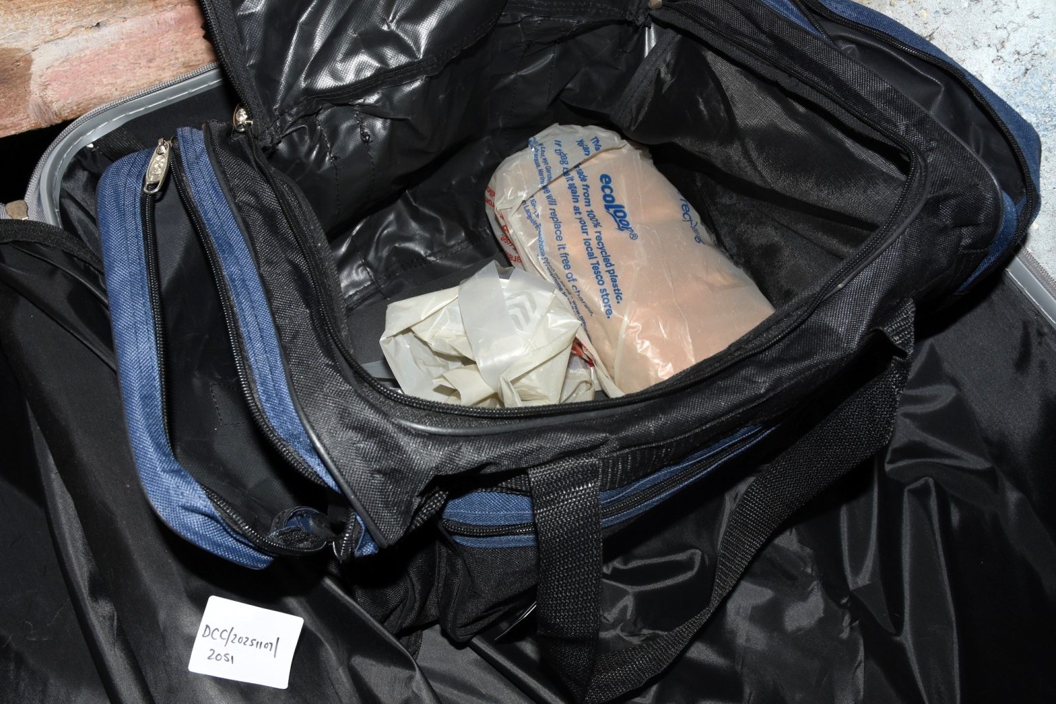 Drug dealer caught with cocaine in a Tesco bag for life before police found £500,000 worth hidden in a pink suitcase in his garden shed - now jailed for over five years.