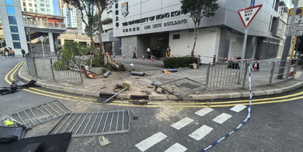 An elderly driver ploughed into a crowd of tourists in Hong Kong after reportedly mixing up the pedals - nine people were injured including eight pedestrians on the street.