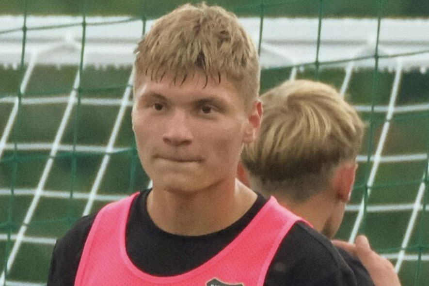 Footballer, 20, arrested for stabbing businesswoman to death in front of her teenage daughter after phone scammers convinced him to carry out an "operational assignment".