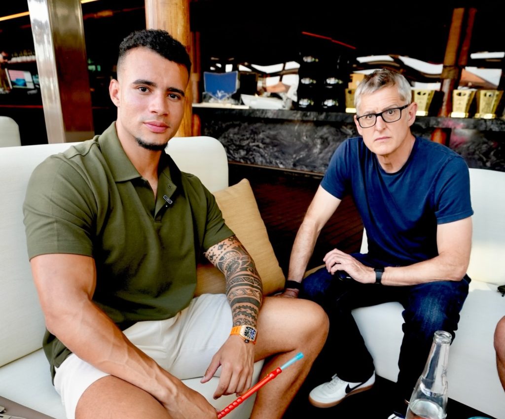 A drone strike sparked a massive fire near Dubai airport, briefly halting flights as dramatic footage showed flames lighting up the skyline, leaving locals shaken.