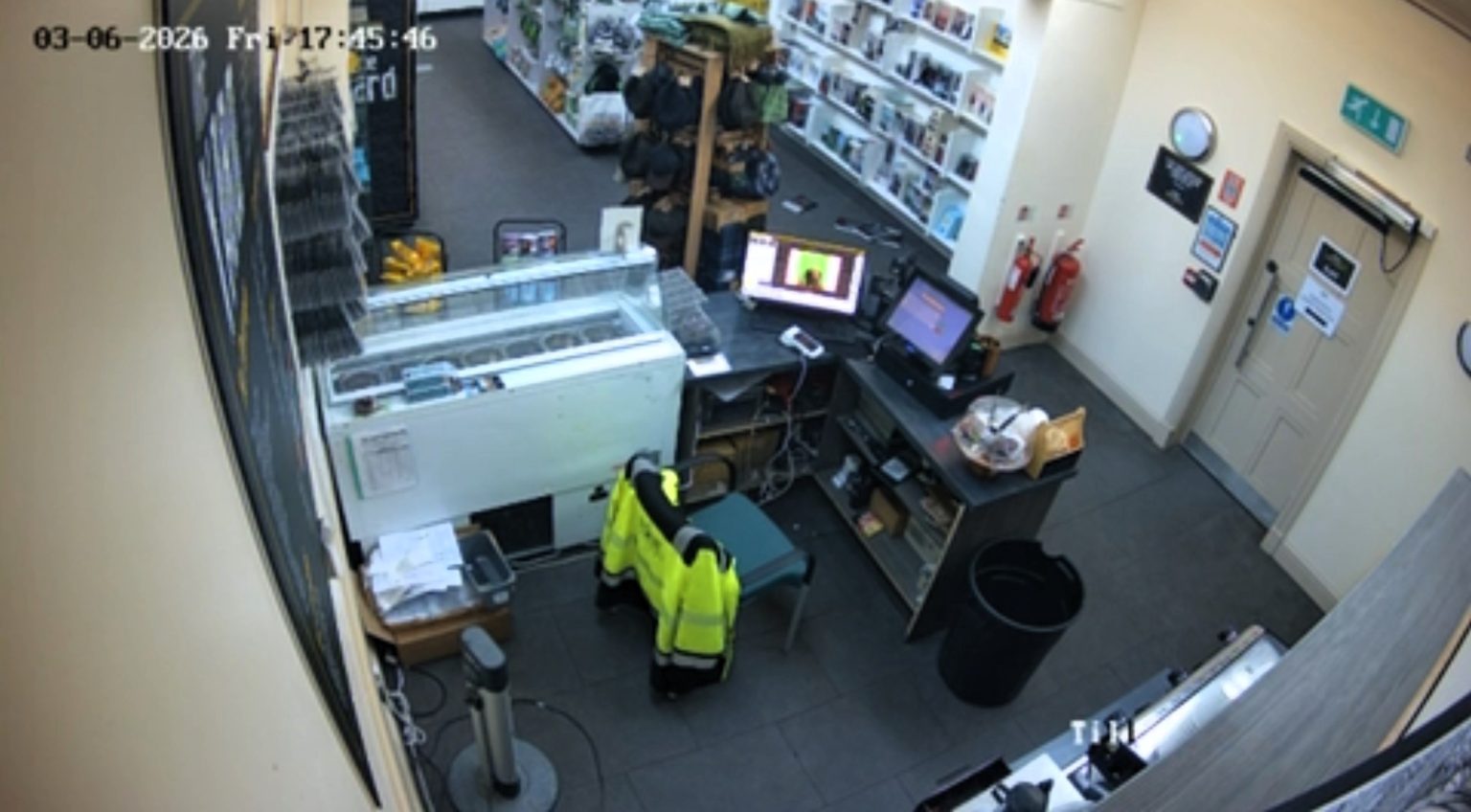 Spooky CCTV footage shows books flying off a shelf in an empty shop at a 150-year-old former jail where 15 prisoners are still buried within its walls.