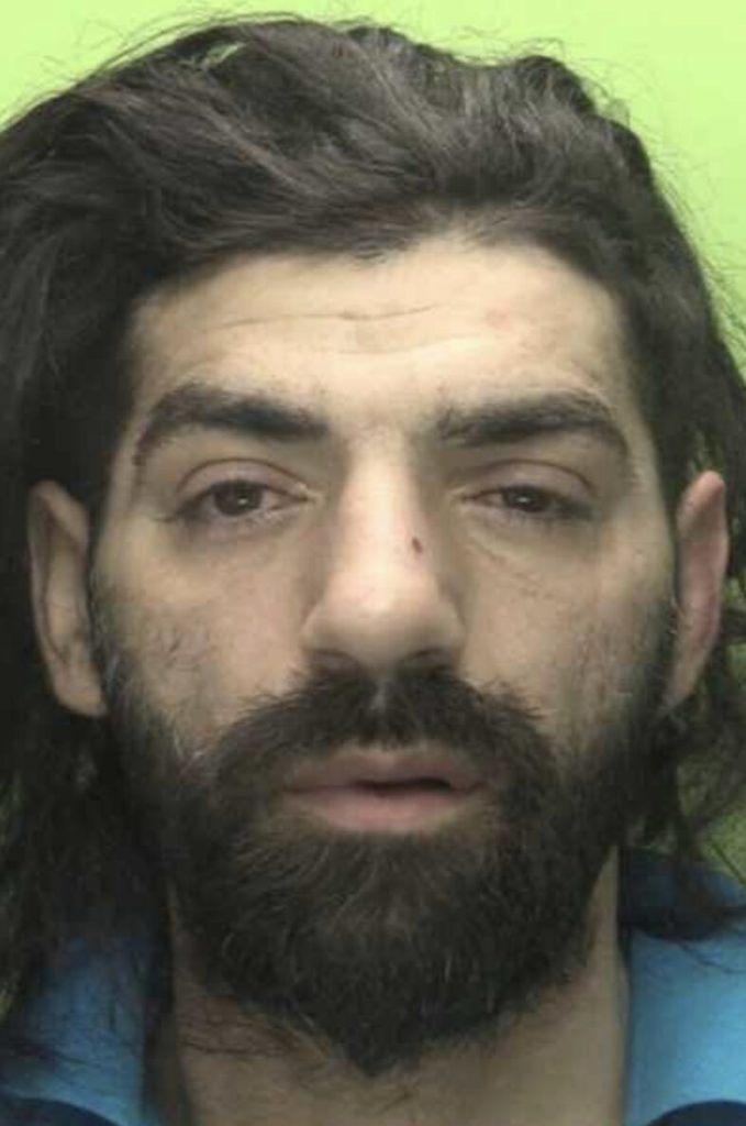 A burglar was caught eating a sandwich in the kitchen of a flat he broke up into - police then found stolen jewellery stuffed in his pockets before jailing him for 32 months.