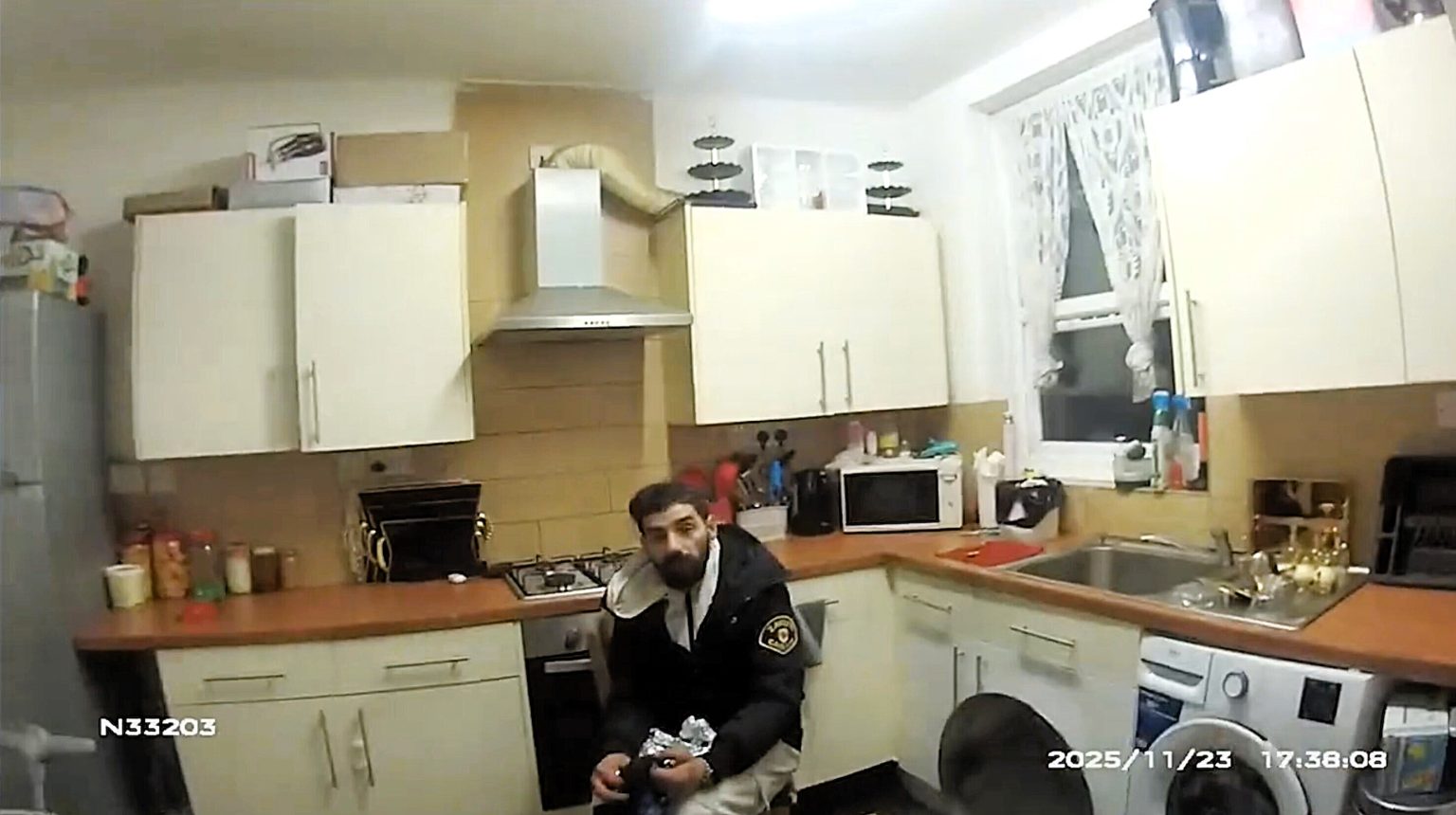 A burglar was caught eating a sandwich in the kitchen of a flat he broke up into - police then found stolen jewellery stuffed in his pockets before jailing him for 32 months.