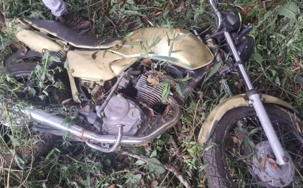 Woman shot three times at her own mother's funeral as gunman on motorcycle opened fire at point-blank range during the procession - a bullet even pierced the coffin in Brazil.