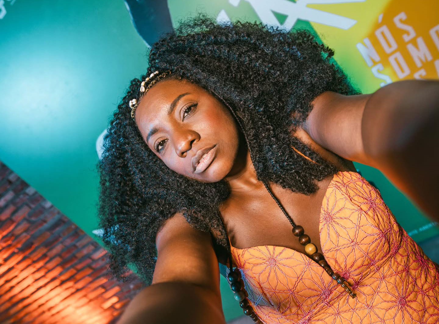 Brazilian samba singer Adriana Araujo dies at 49 after collapsing at home from a brain aneurysm - she rose to fame performing rooftop concerts during the Covid-19 lockdown.