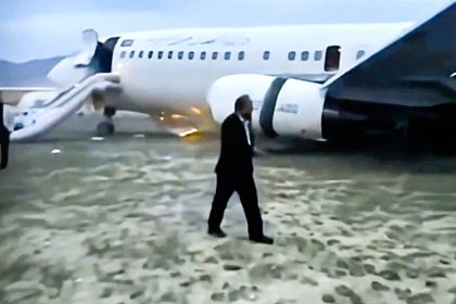 Passengers evacuate via emergency slides after a plane overshoots the runway in Kabul, as the damaged aircraft prompts flight disruptions and an ongoing investigation
