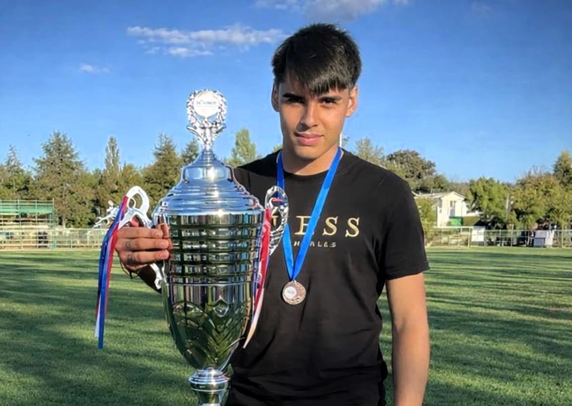 Teenage footballer Tomas Bustamante Carriel shot twice in the chest and left outside a health centre in Chile - a 19-year-old suspect has been arrested on suspicion of murder.