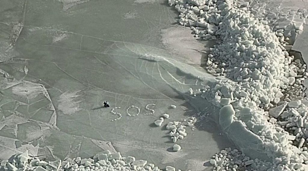 Two stranded tourists spelled SOS with ice blocks after their floe broke apart in the Baltic Sea, surviving hours adrift before a dramatic cross-border rescue saved them.