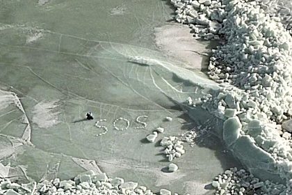 Two stranded tourists spelled SOS with ice blocks after their floe broke apart in the Baltic Sea, surviving hours adrift before a dramatic cross-border rescue saved them.