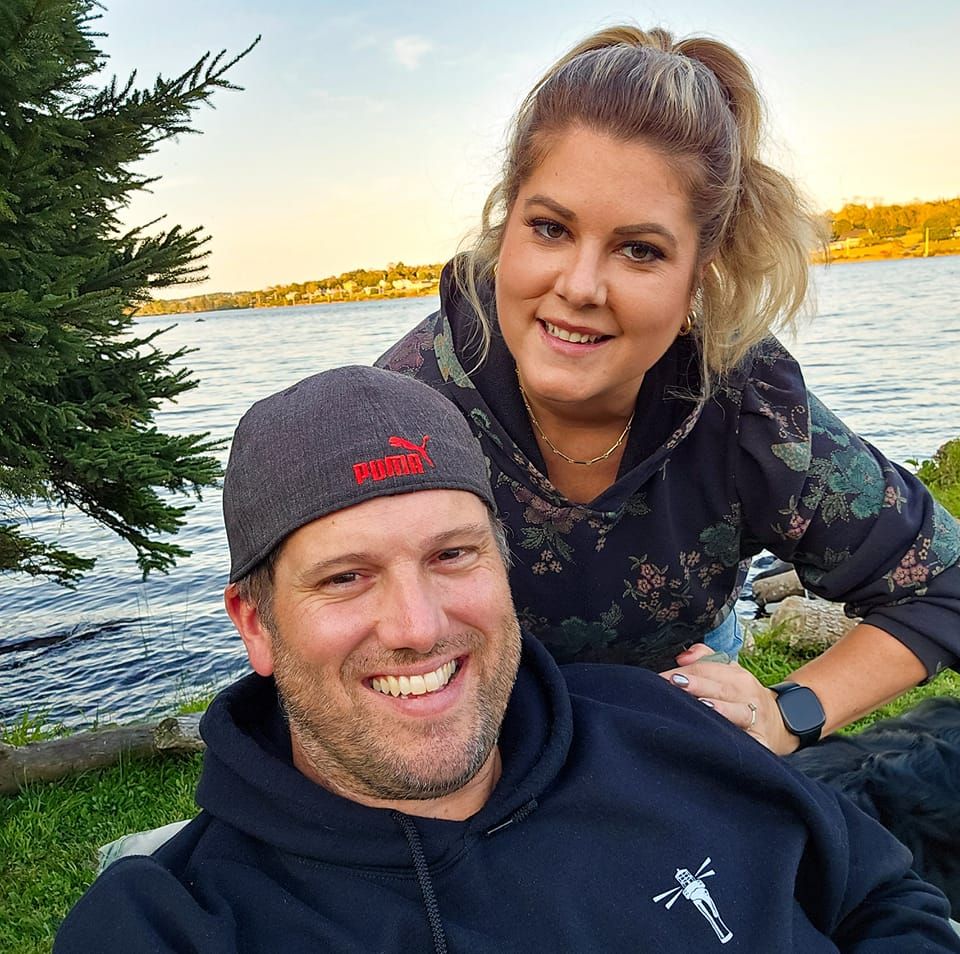 Shocking footage shows a furious driver kicking a bike and grabbing a biker during a heated road rage clash on Harrow Road in Wembley - as stunned motorists watched in horror.