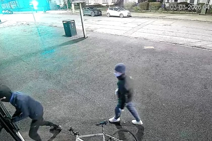 Two masked men caught on camera trying to kick down shop shutters at 4am in Dundee - before asking someone upstairs to open up because they were starving for food.