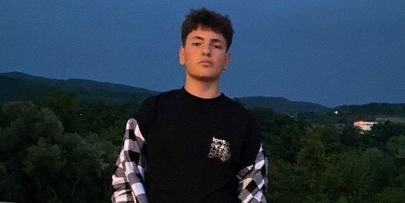 An 18-year-old volleyball player died after being struck by a train while wearing headphones, with early reports suggesting he didn’t hear it as investigations continue.