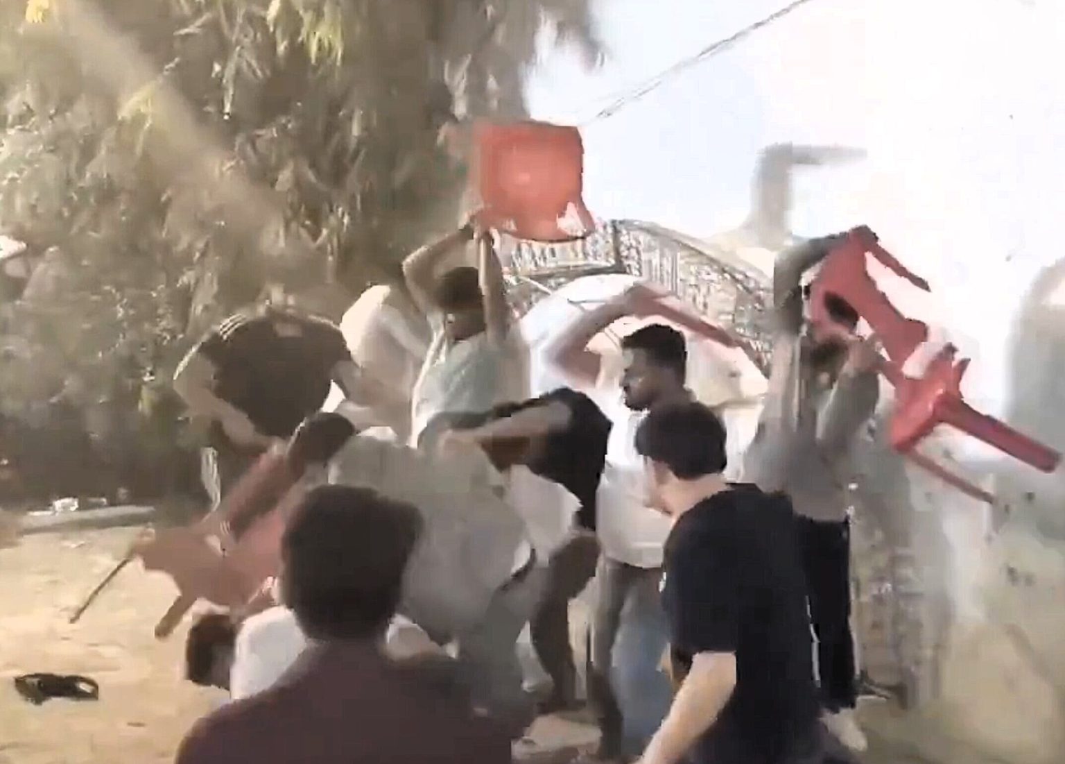 A wedding descended into chaos after a row between guests turned violent - with chairs used as weapons and reports of gunfire at the venue in Lucknow, India.