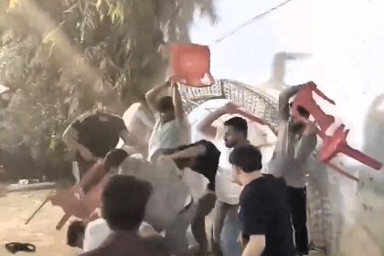 A wedding descended into chaos after a row between guests turned violent - with chairs used as weapons and reports of gunfire at the venue in Lucknow, India.