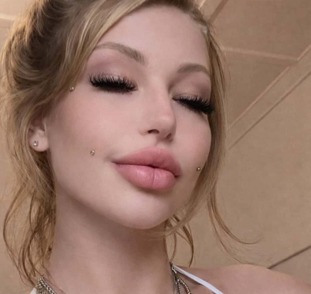 Australia's most tattooed woman halts her plans to remove 36 tattoos after using AI to see her bare face - saying she was completely freaked out by what she saw.