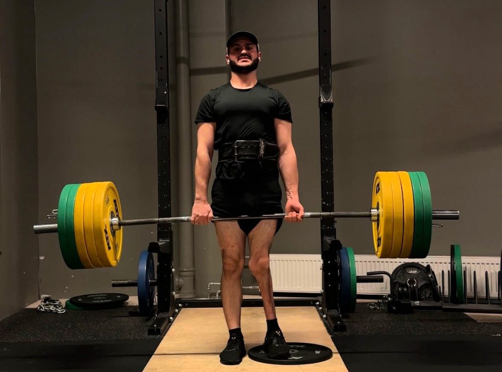Farshid Esmaeili's leg was crushed at age 12 and doctors urged amputation - but after 27 surgeries he defied the odds and now lifts heavy weights at the gym every day.