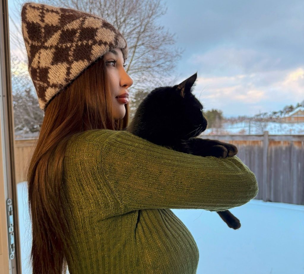 Influencer Louisa Khovanski spent £22,000 to save her rescue cat Morty after vets warned he might not survive - now dubbed a miracle cat after a dramatic recovery from the brink.