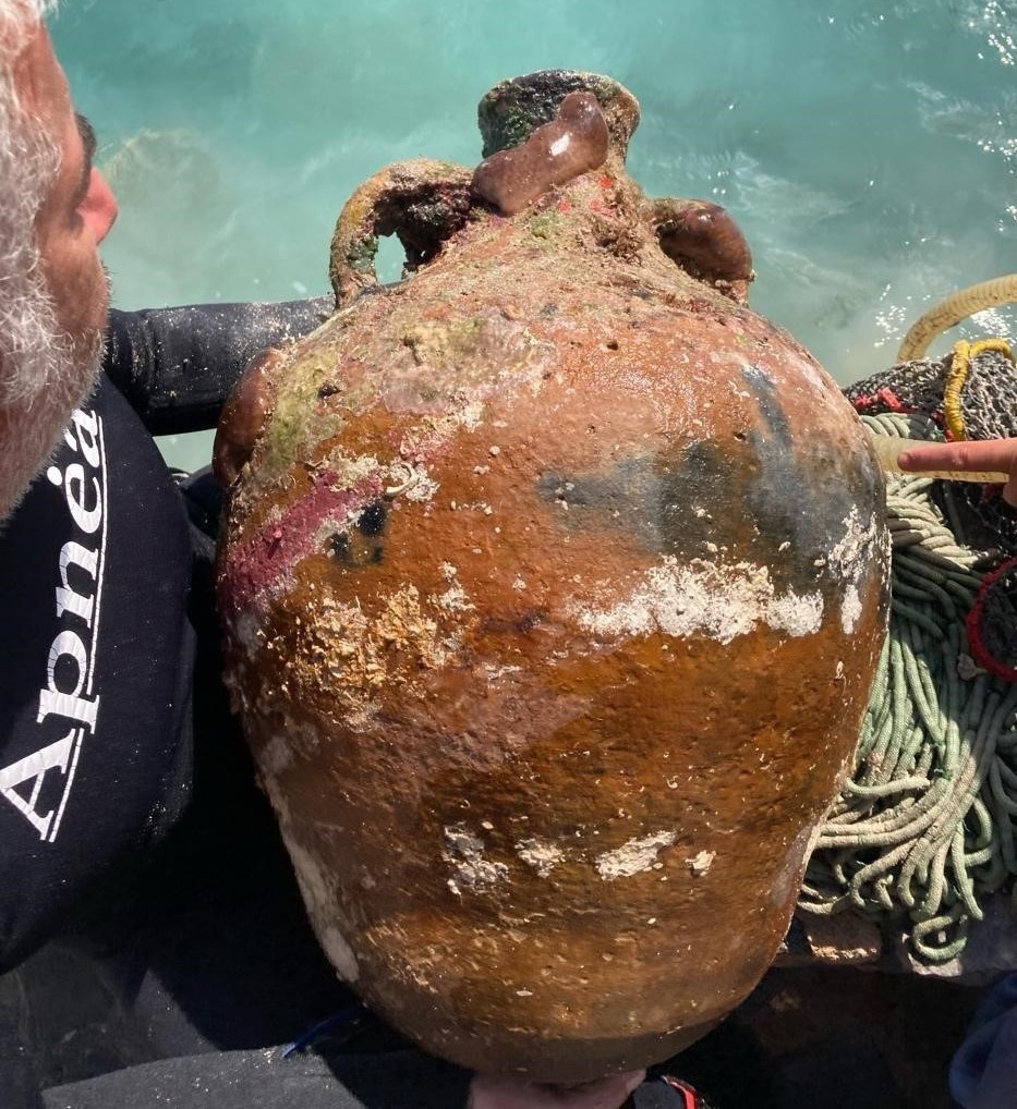 A shipwreck graveyard spanning more than 2,600 years has been discovered off a Greek island - with five ancient wrecks and dozens of artefacts found buried beneath the sea.