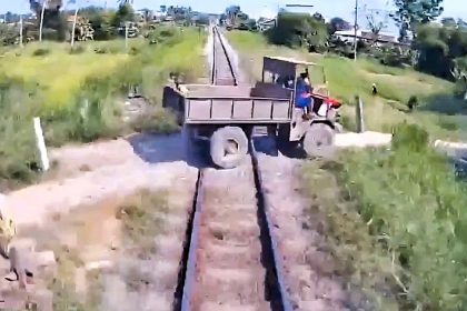 Dashcam footage captured a 10-year-old boy being hurled into the air when a train struck a farm vehicle at an unofficial, unguarded level crossing in Vietnam, killing the child.