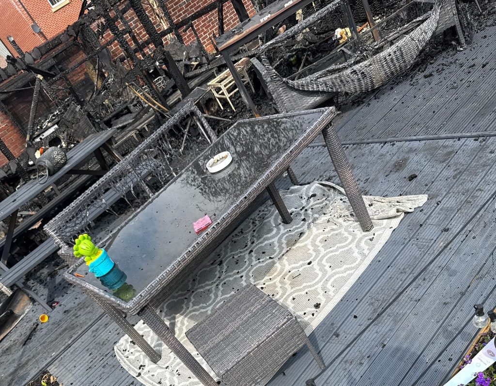 A Brit was left devastated after a neighbour's e-bike spontaneously burst into flames and torched his garden - just days before a mini heatwave.