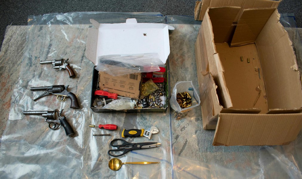 Teen drug dealer Henri Nikolli jailed after trying to smuggle a handgun disguised as a canine training kit to his parents' home - police found an arsenal of weapons inside.