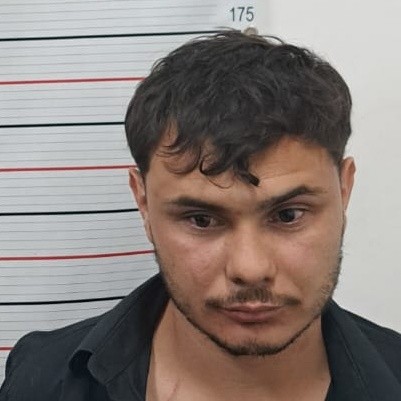 A Brazilian man was arrested after allegedly biting off part of his girlfriend's ear at a restaurant because she had spent too long in the bathroom queue at a music event.