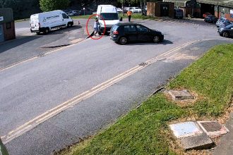 A business owner was deliberately knocked down by a white van after confronting thieves who had raided her premises in Oswestry, leaving her and her partner with injuries.