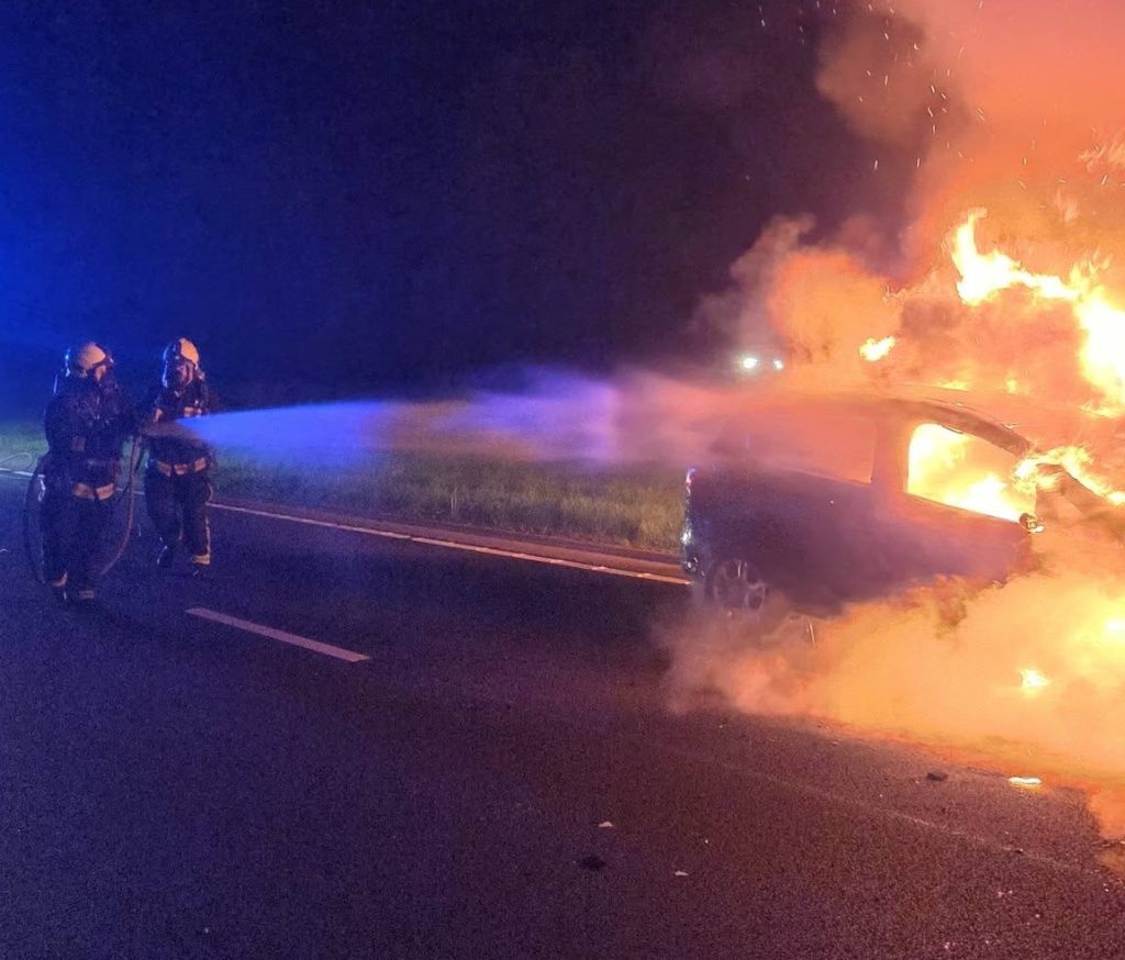 A car was completely engulfed in flames on the A38 near Ivybridge after a late-night fire shut the road. Firefighters arrived in just 21 seconds and found smoke pouring from all areas.