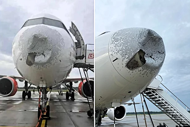 An Airbus A320 was left with a gaping hole in its nose and severe structural damage after flying into a violent hailstorm over Poland - but all passengers and crew escaped without injury.