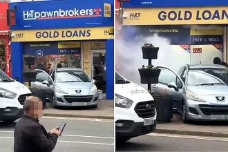A masked gang rammed a car into a Birmingham pawnbrokers in broad daylight, smashing windows and looting gold jewellery before fleeing in the same vehicle used in the raid.