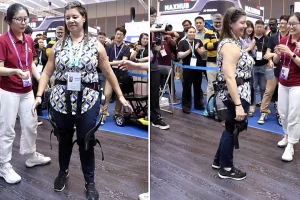A paraplegic woman moved onlookers to tears at a Chinese trade fair after a robot exoskeleton had her on her feet and walking within just 30 minutes of arriving.