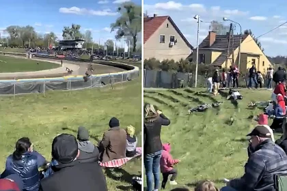 A runaway speedway motorcycle flew over a safety barrier and nearly hit spectators in Poland after a 16-year-old rider lost control, with fans scrambling to avoid the airborne bike.