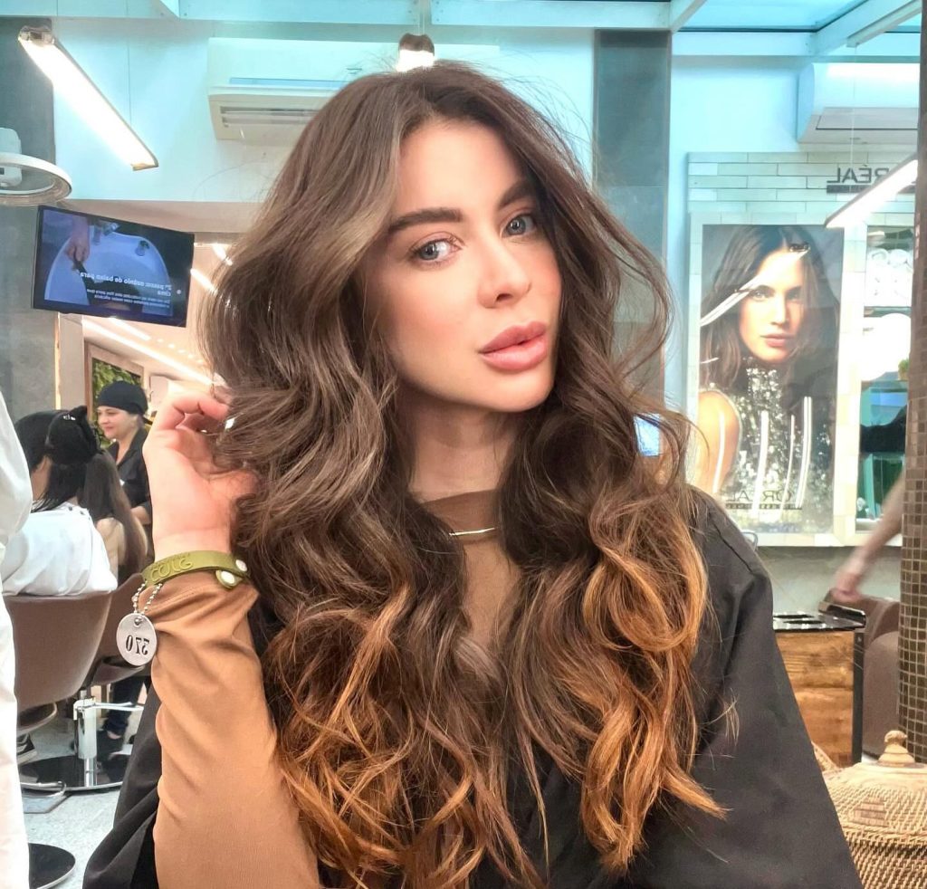 A Brazilian beauty queen was allegedly pushed from a 13th-floor balcony by her jealous boyfriend, who was later found dead in police custody after being arrested for femicide.