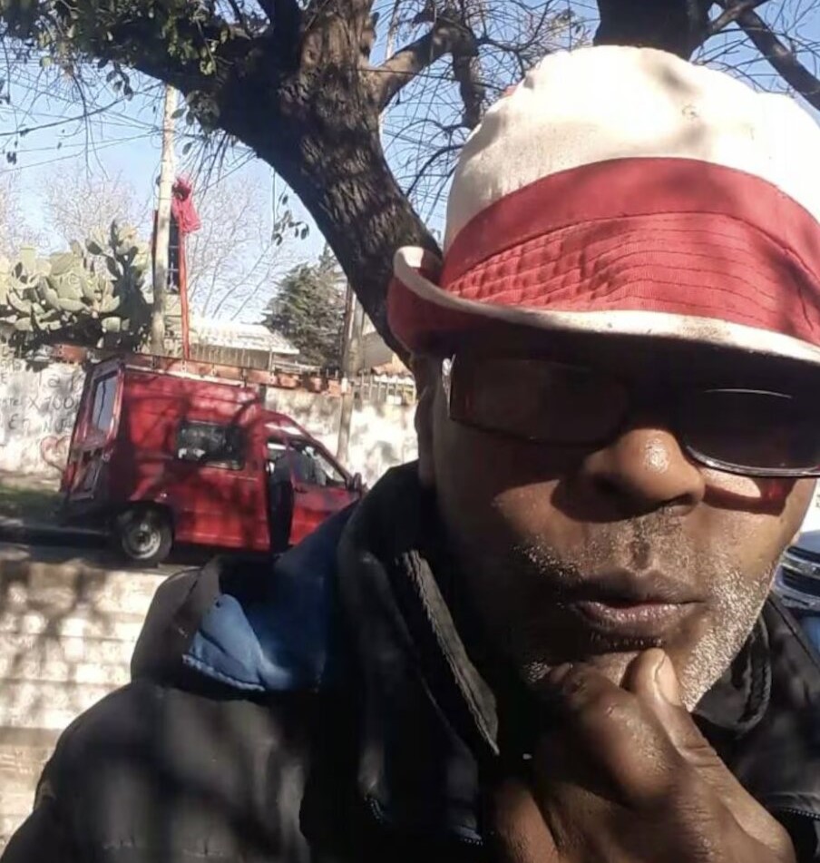 Two men have been arrested after a pioneering rapper was found buried in a septic tank at his home, with police investigating a suspected robbery turned deadly.