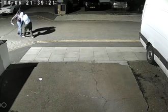 Shocking footage captures a hooded man lunging at a victim with a large knife on a quiet Southall street, as police appeal for witnesses following the terrifying clash.