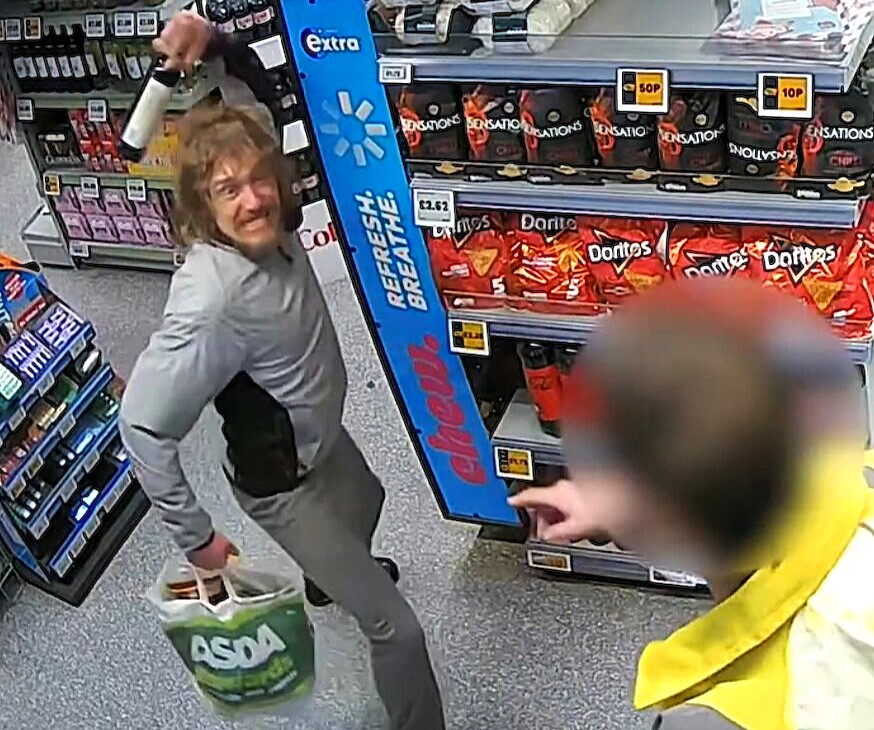 A volatile thief who threatened supermarket staff with needles and a wine bottle during a terrifying robbery has been jailed for 22 months after pleading guilty.