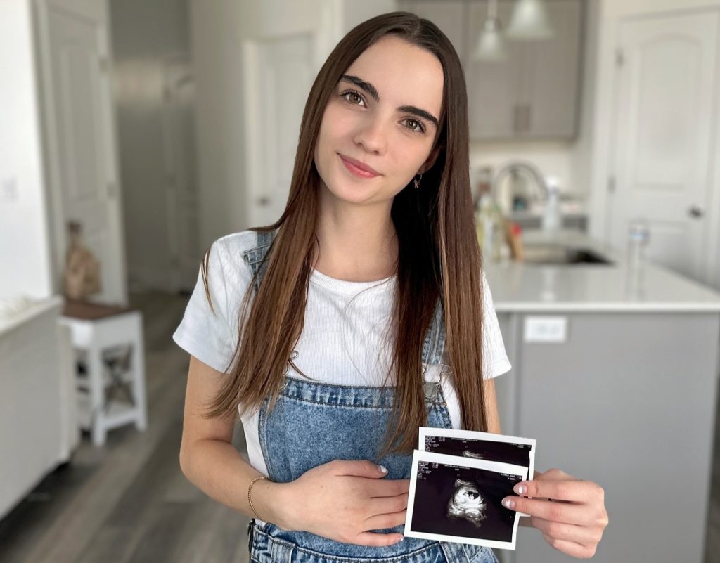 A teen mum who had three babies by 19 turned hateful comments into motivation - and jokes her 40s are going to be lit while her friends are still raising kids.