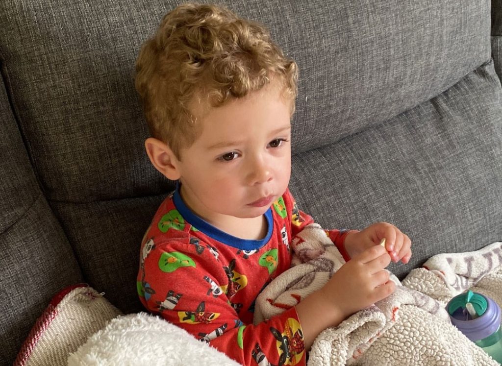 A mum is urging parents to trust their gut after doctors repeatedly dismissed her son's symptoms as constipation and teething - leaving him just hours away from death.