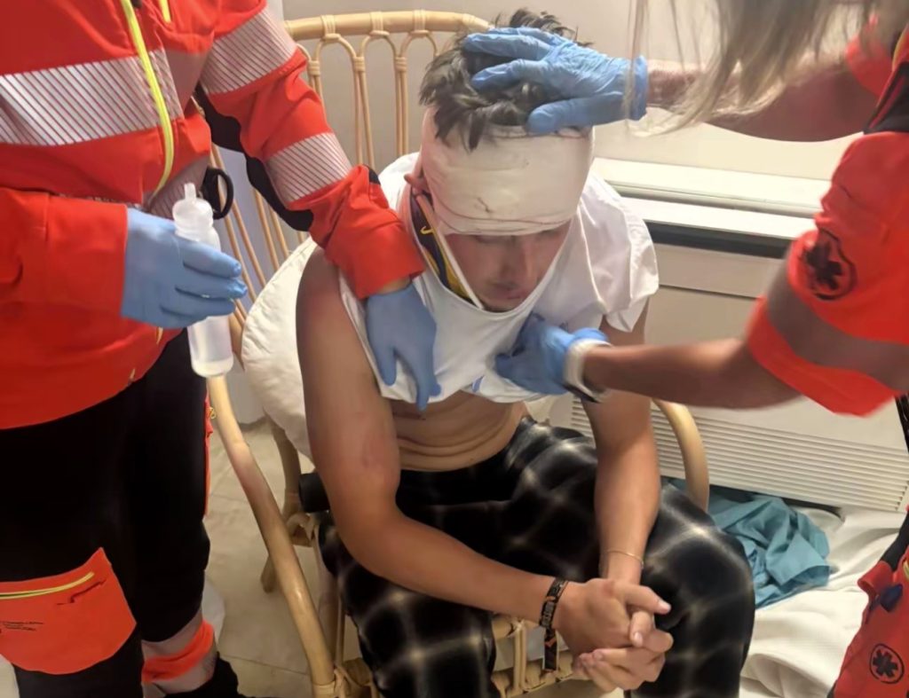 Brit left stranded on a lads holiday after a fractured eye socket and bruising on the brain stops him flying home - all thanks to his Lightning McQueen Crocs.